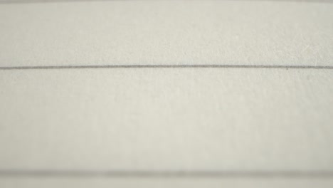 Makrodetail-Einer-Linie-Auf-Notizbuchpapier