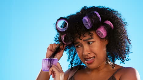 black woman, curlers and upset with hair by studio