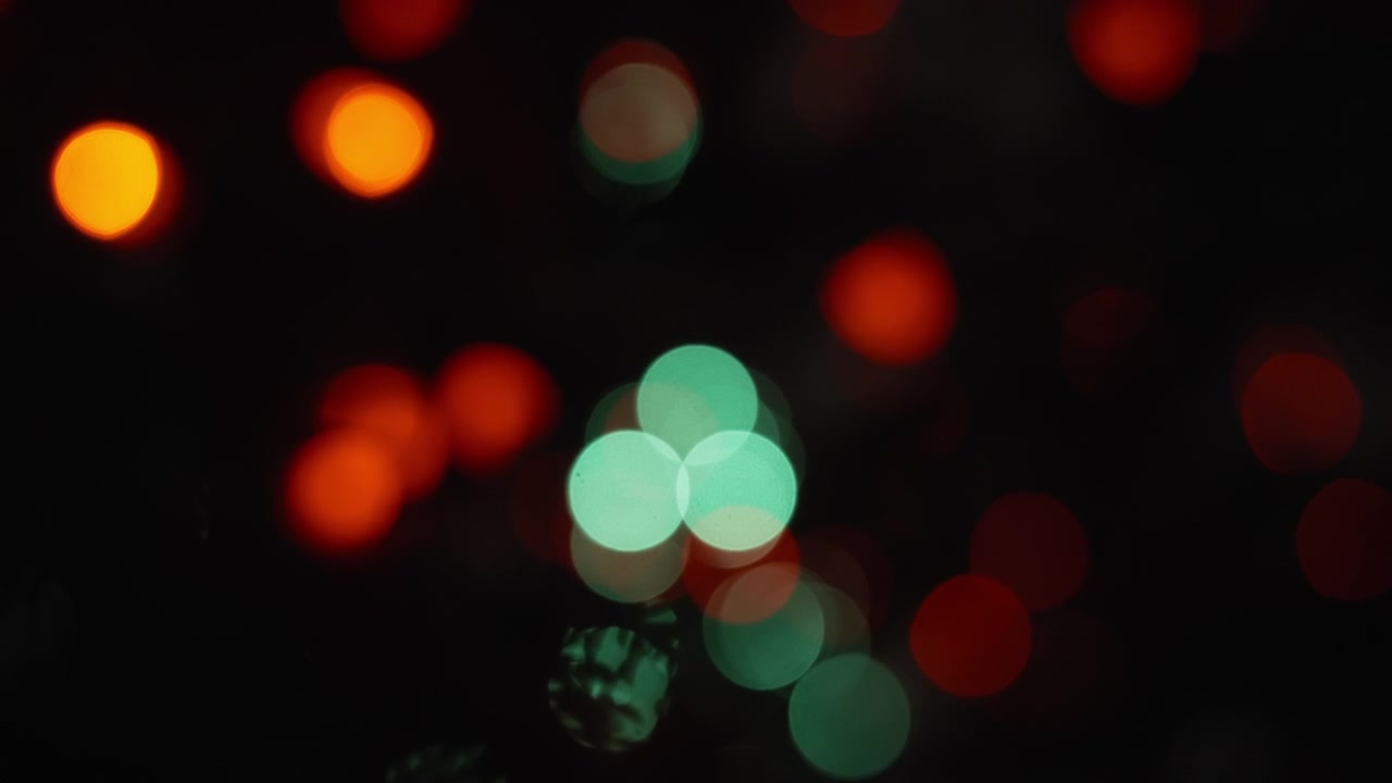 Red and green lights flicker in the dark