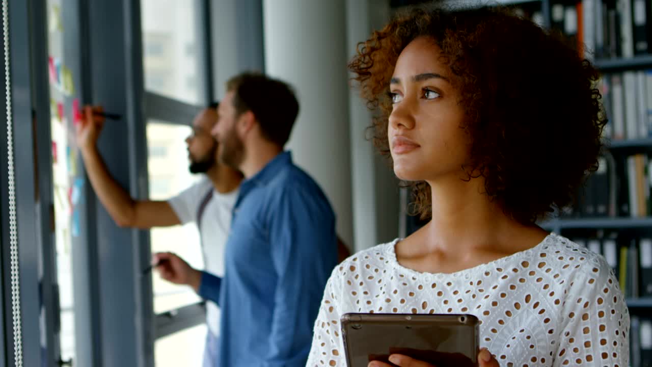 Female architect using digital tablet 4k