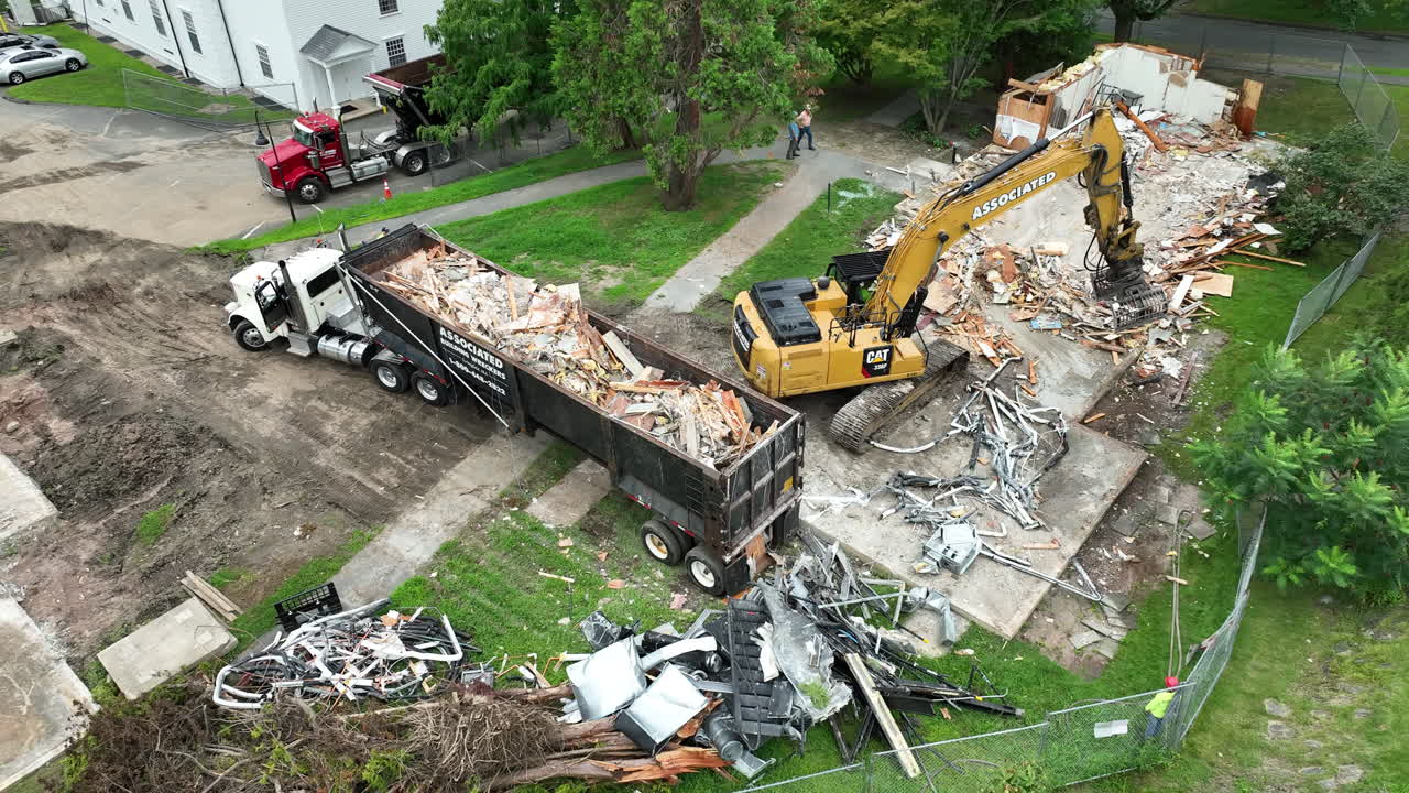 Tilt up shot of house demolition