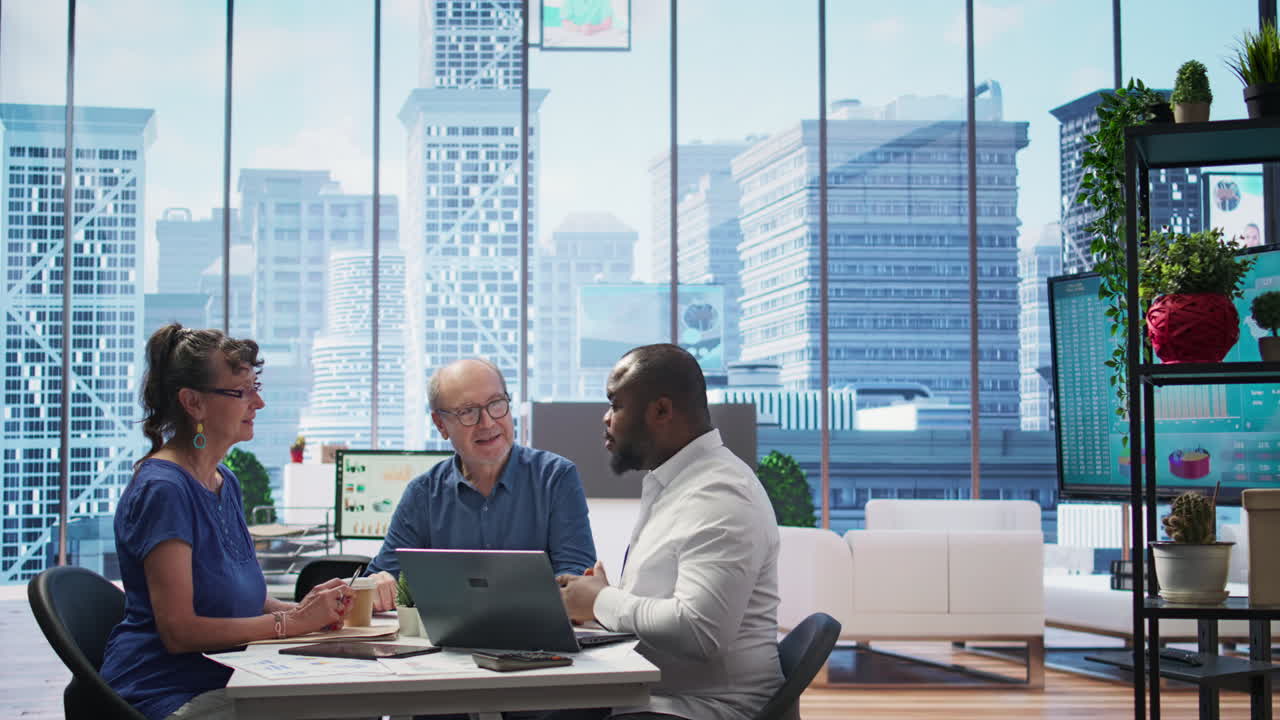 Mature couple engaged in a serious discussion with a financial banker