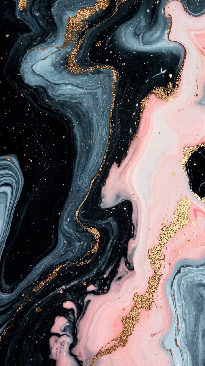 Abstract marble texture with black, pink, and gold swirls. Top-down angle, reminiscent of a fluid