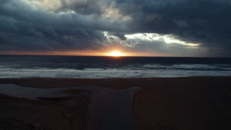 sunset after a storm on the sea in piscinas, sardinia