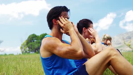 fit people performing crunches exercise 4k