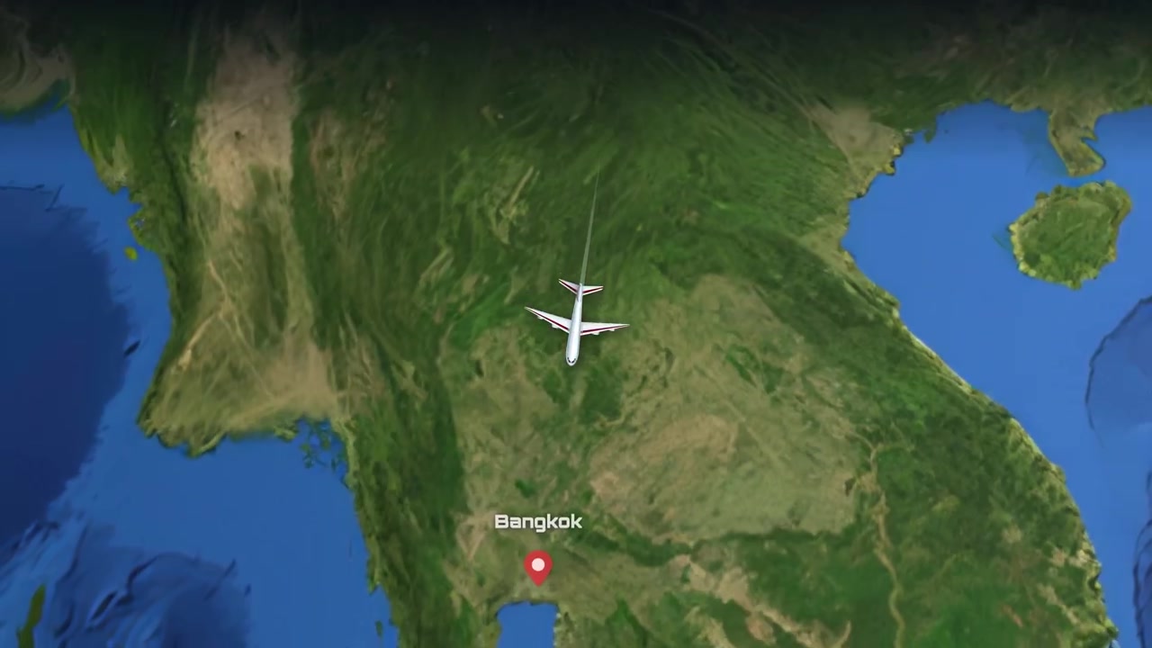 Satellite view animation follows a commercial airplane flying from Chicago across the globe to Bangkok