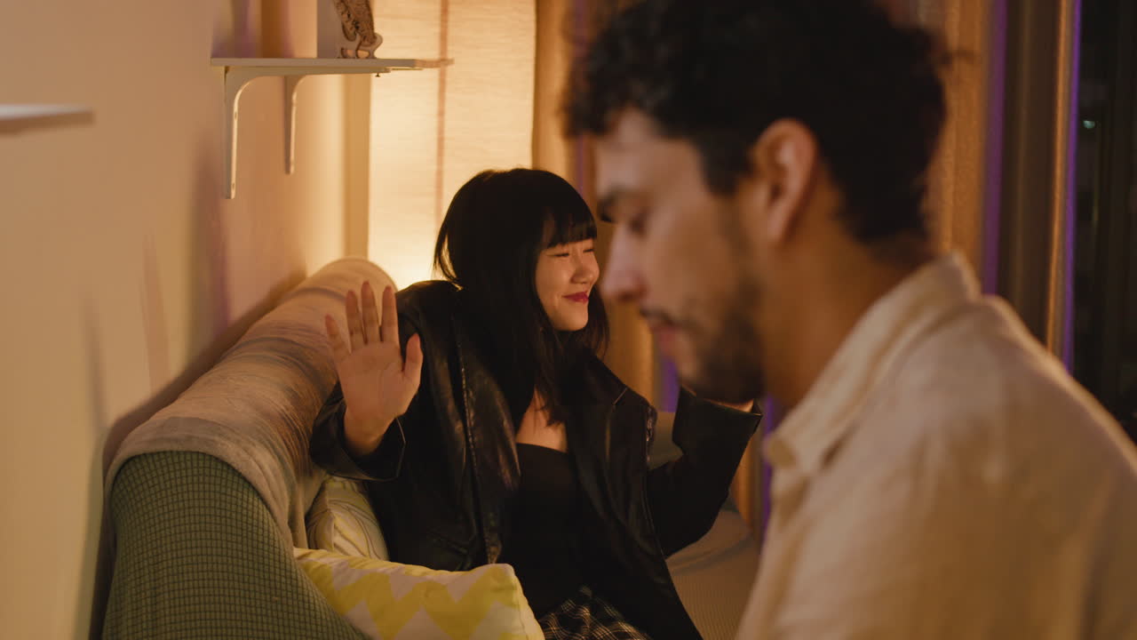 People talking on a couch