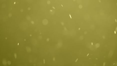 yellow bokeh particles swirling