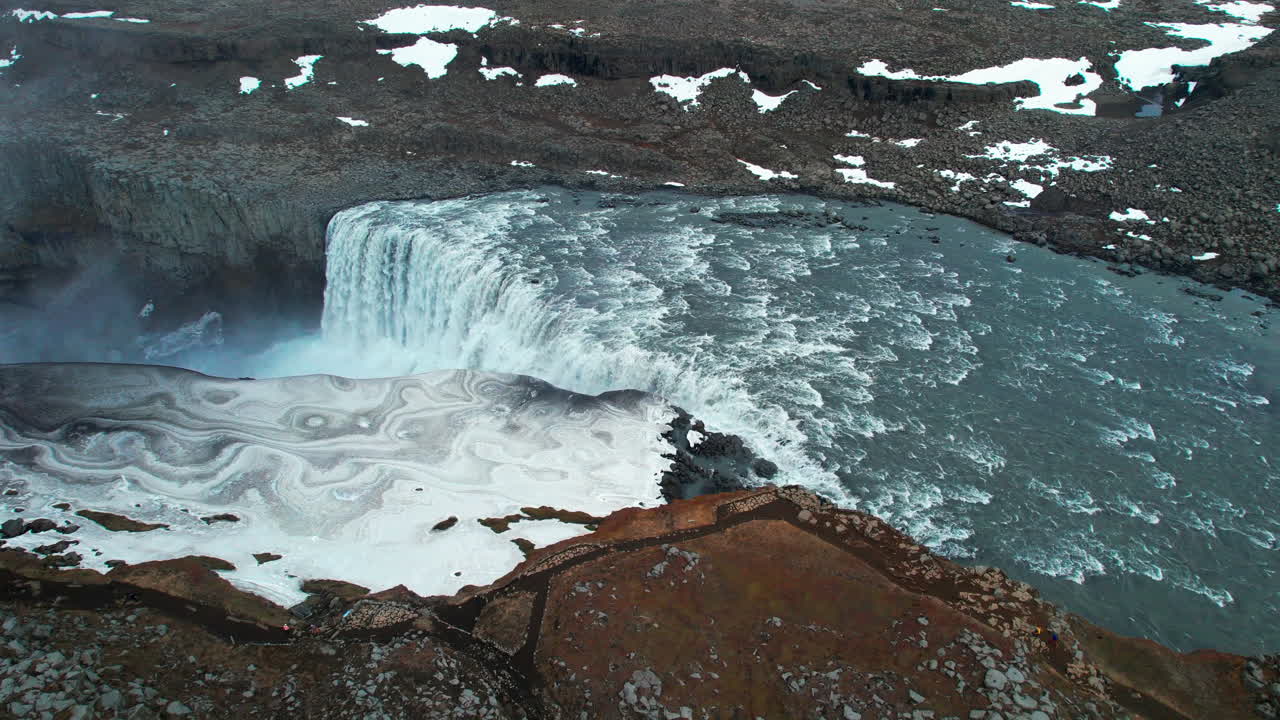 Powerful Dettifoss waterfall cascading in a scenic Icelandic landscape
