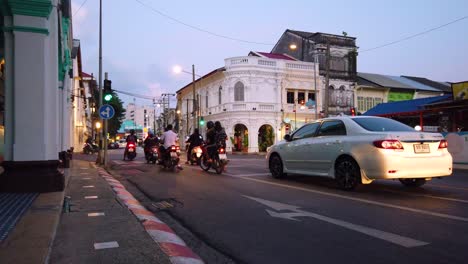 evening traffic and historic buildings in phuket old town