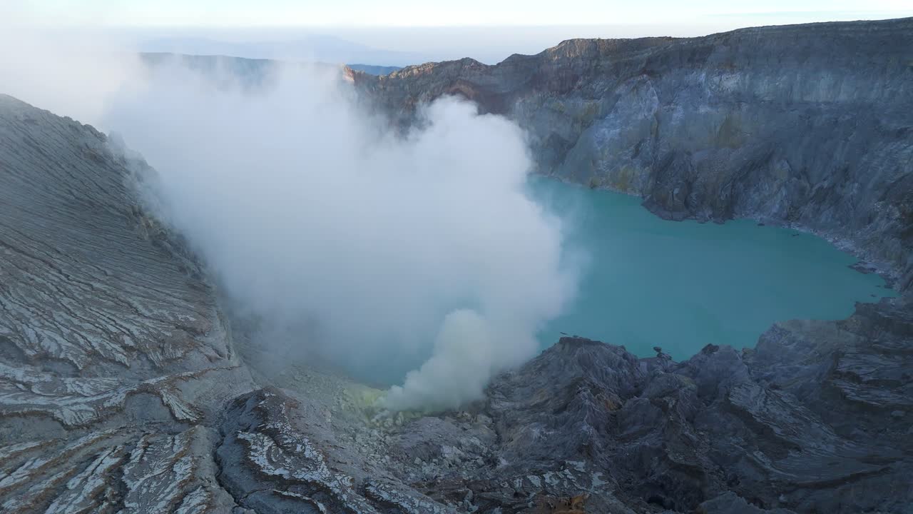 Toxic Sulfuric Gases Rising from Ijen Crater in Indonesia. Aerial view. Early morning dawn