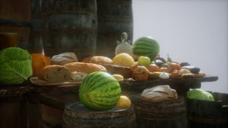 food-table-with-wine-barrels-and-some-fruits,-vegetables-and-bread