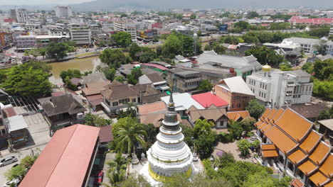 stupa of wat ket karaam in proprakklao road, mueang chiang mai, chiang mai, thailand. aerial drone shot