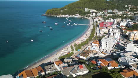 Beautiful-Pan-Up-Reveals-Himare,-Albania.-Albanian-Riviera
