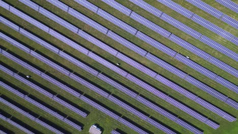 Lovely-aerial-top-view-flight-Solar-field-plant-factory-at-village-Chlum,-Czech-Republic-Summer-2023