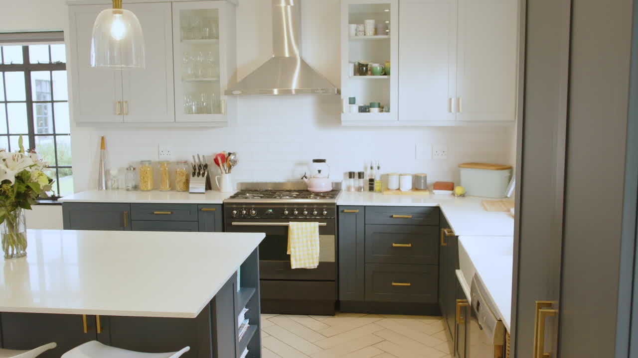 Modern kitchen with sleek appliances and stylish cabinetry, ready for cooking, at home