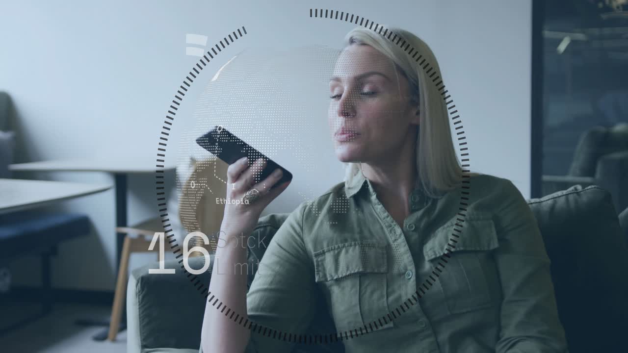 Woman raising phone and speaking on sofa, circular HUD expanding while receiving real-time numbers