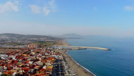 Drone-footage-of-the-coast-line-in-Linea-De-La-Concepcion,-Spain