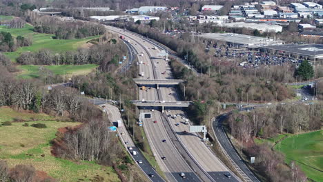 Aerial-close-up-shot-of-M27-Smart-Motorway-midday-sunny-UK-4K