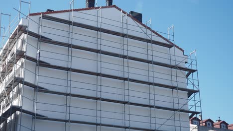 white building with scaffolding