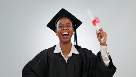 woman, graduation and diploma of student in studio