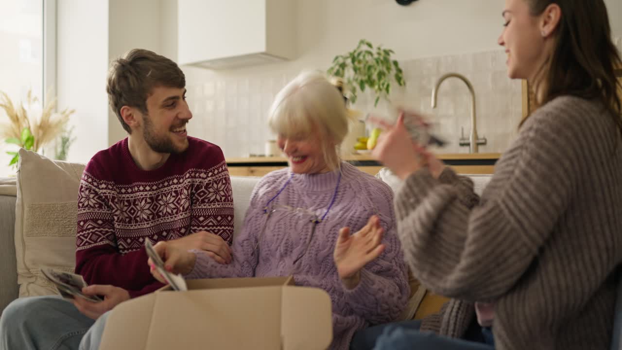 Family Looking Through Old Photos