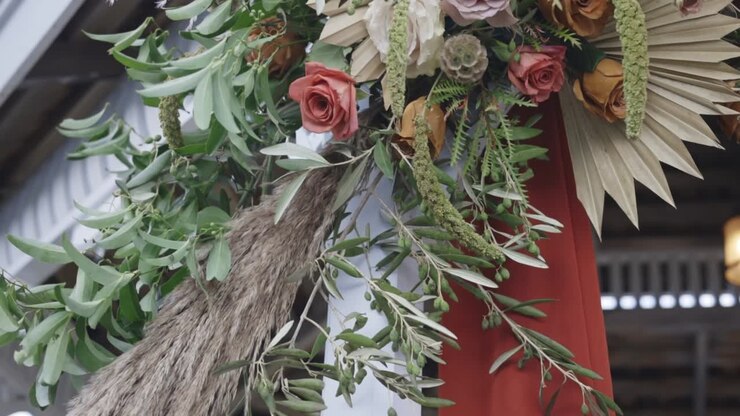 Beautiful arch of flowers at wedding ceremony