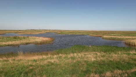 small lagoons near tollesbury marina in essex, united kingdom