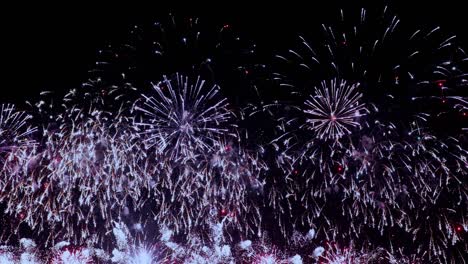 colorful fireworks exploding in the night sky. celebrations and events in bright colors.