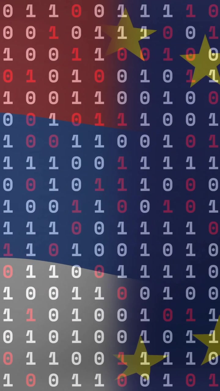 Animace binárního kódu překrývající barvy vlajky s hvězdami, symbolizující digitální data.