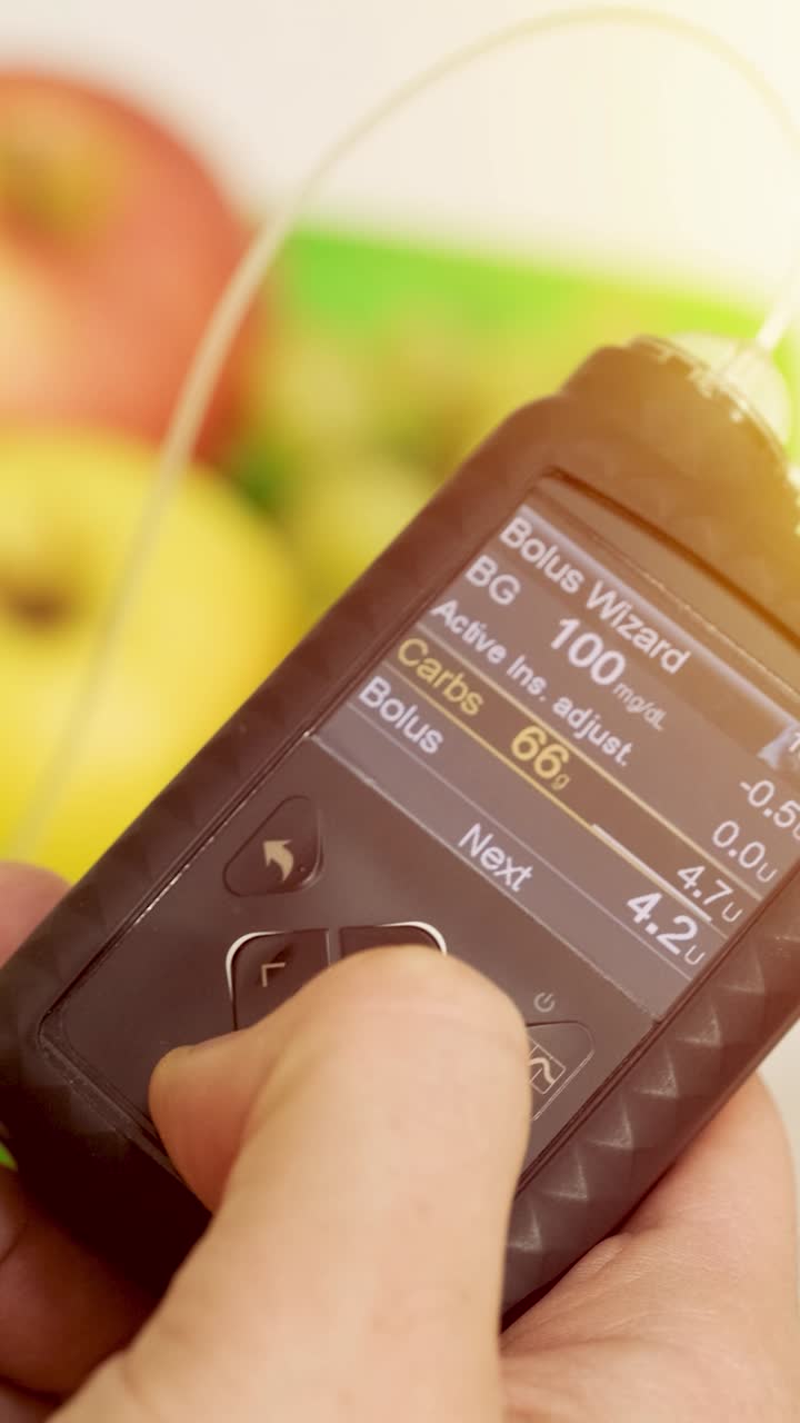 Hand Adjusting Insulin Pump for Carb Calculation with Fruit
