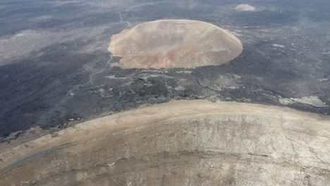 volcano-craters-on-the-island-of-lanzarote-in-spain,-4k-aerial-drone-footage