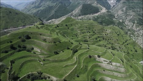 terraced hills in a mountain valley