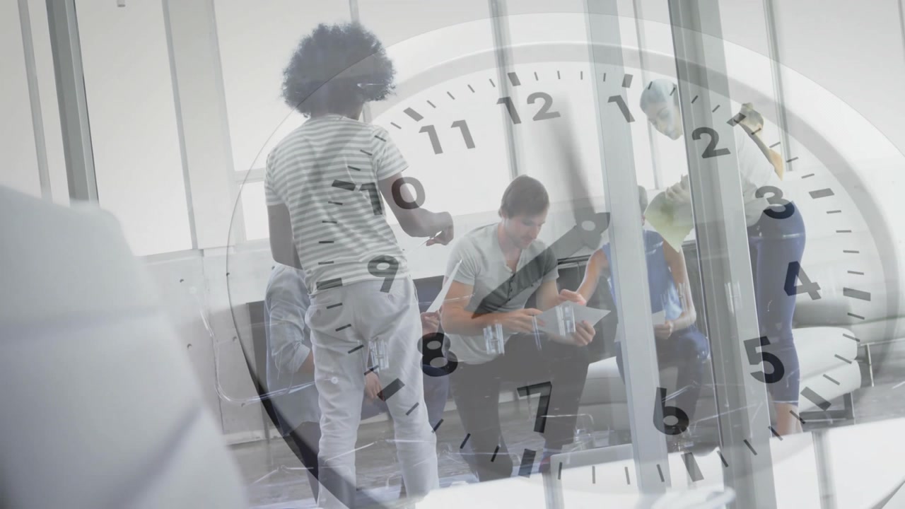 Animation of clock moving over diverse colleagues discussing work