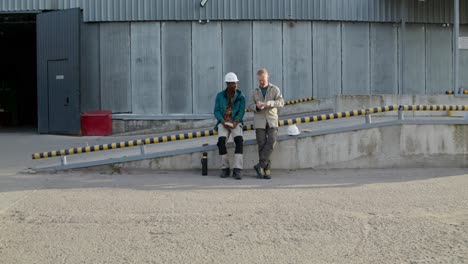 workers taking a lunch break at an industrial facility