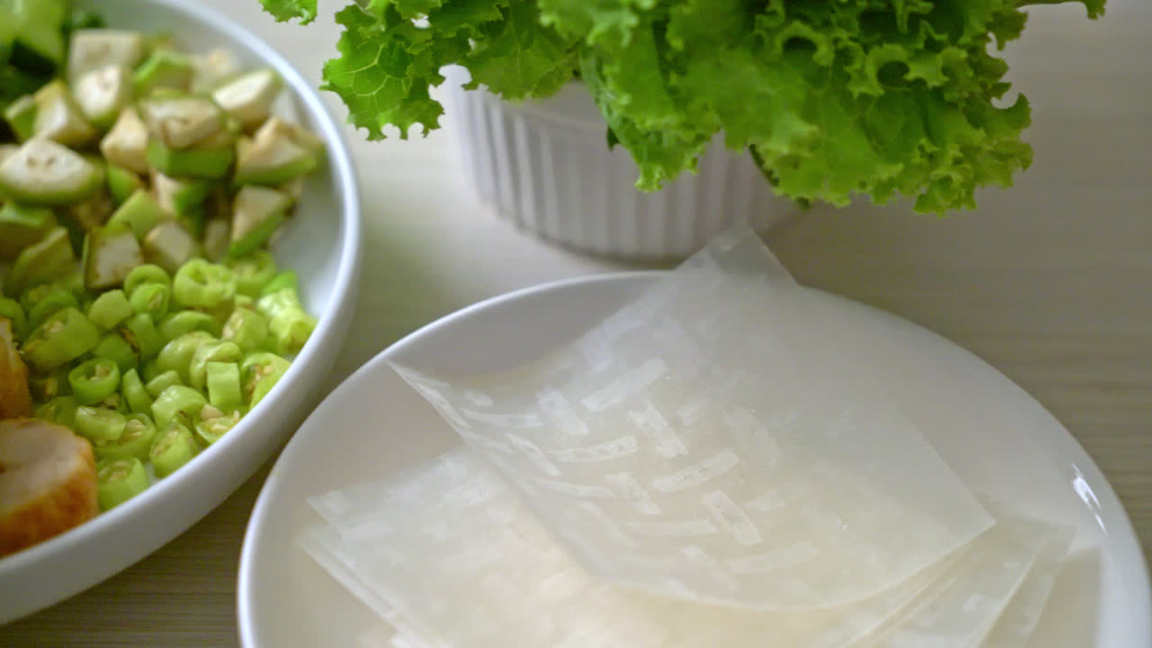 Vietnamese pork meatball with vegetables wraps (Nam-Neaung or Nham Due) - vietnamese traditional food culture