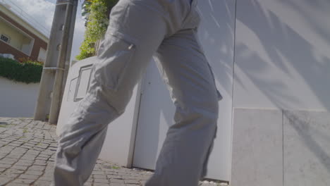 stylish woman dancing outdoors