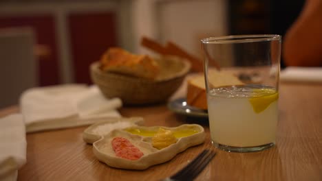 local dishes from guadalajara, spain displayed on a map-shaped plate with a lemonade