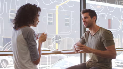 couple meeting for date in coffee shop shot in slow motion