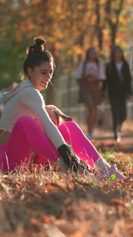 woman and her pug in the park