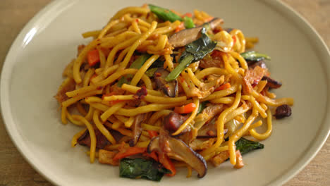 stir-fried yakisoba noodles with vegetable in vegan style - vegan and vegetarian food style