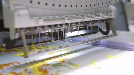 Automatic-industrial-sewing-machine-for-stitch-by-digital-pattern.-Modern-textile-industry.