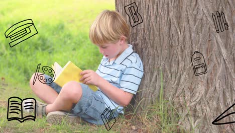 Animation-of-school-icons-over-caucasian-boy-reading