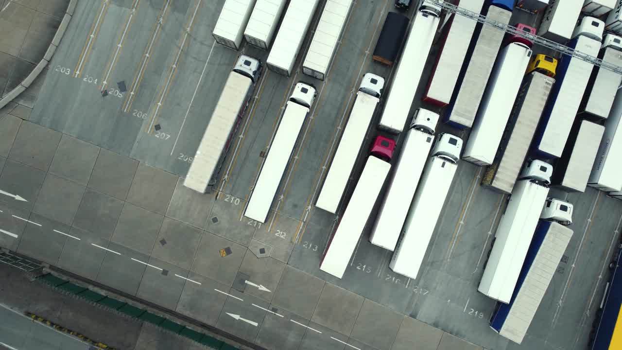 Aerial View of Trucks and Trailers in Parking Lot