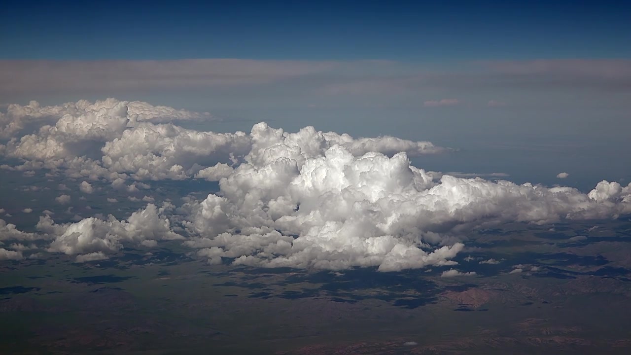 Aerial View of White Clouds Over Landscape