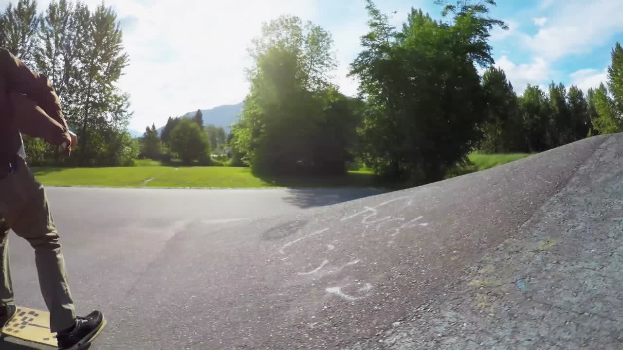 Man rides a skateboard on the road 4k