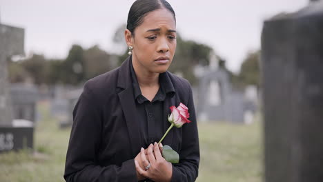 Sad-woman,-rose-and-graveyard-in-loss