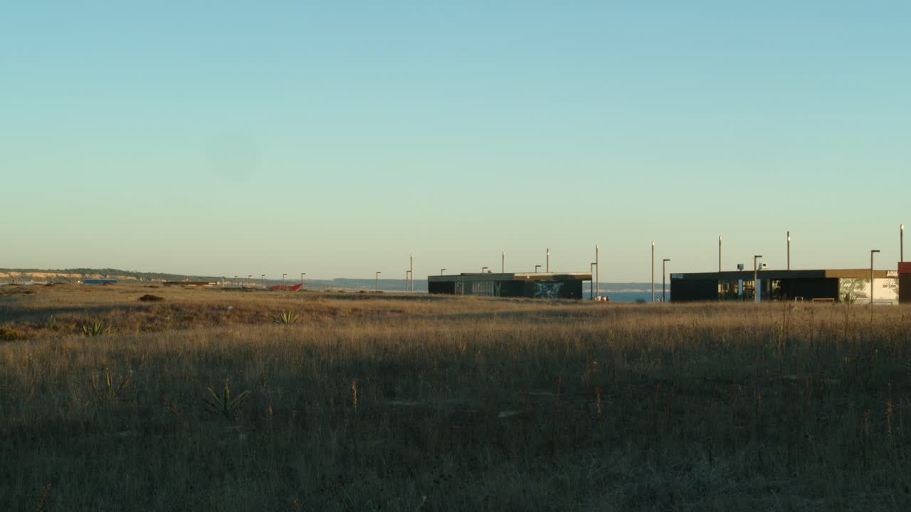 Static shot with Zcam E2-S6 and Roikinon 24mm, of fields at the back of the beach bars in Costa Da Caparica, Portugal