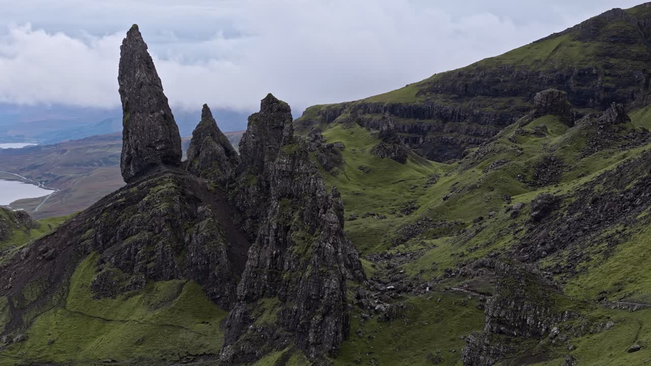Right circling approach of The Old Man of Storr, Isle of Skye, Scotland, with dramatic cliffs and stunning views