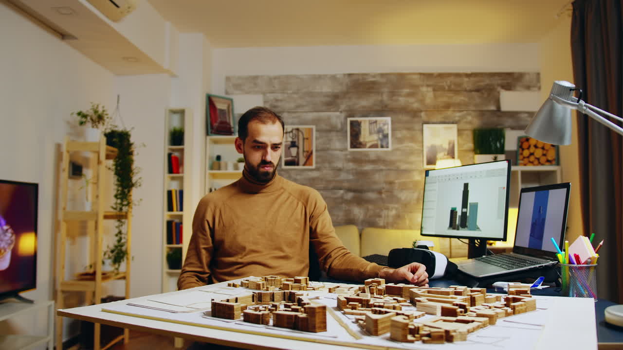 Young architect using augmented reality holograms